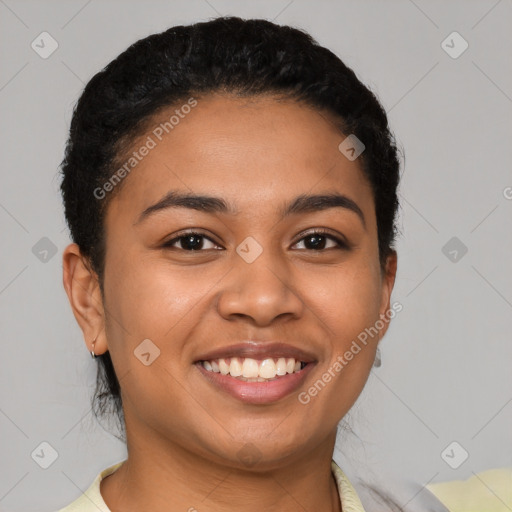 Joyful latino young-adult female with short  brown hair and brown eyes