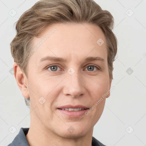 Joyful white adult female with short  brown hair and grey eyes