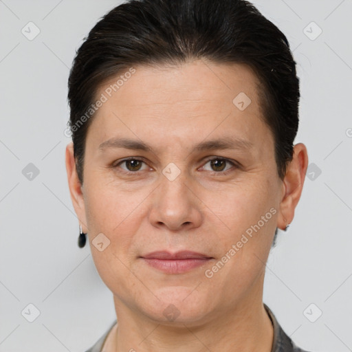 Joyful white adult female with short  brown hair and brown eyes