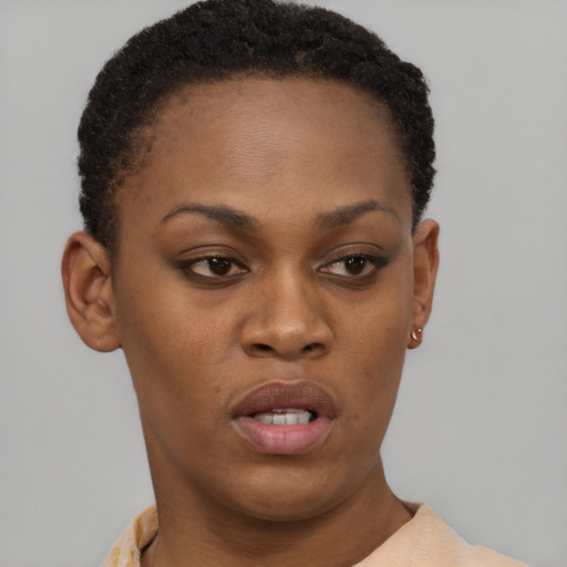 Neutral black young-adult female with short  brown hair and brown eyes