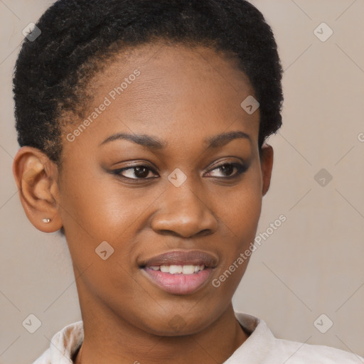 Joyful black young-adult female with short  brown hair and brown eyes