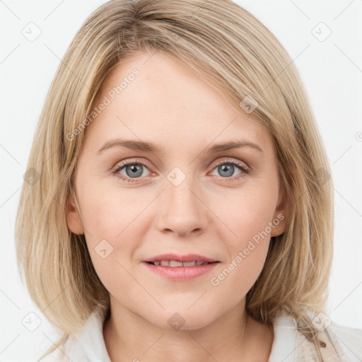 Joyful white young-adult female with medium  brown hair and blue eyes