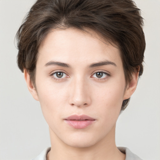 Neutral white young-adult female with short  brown hair and brown eyes