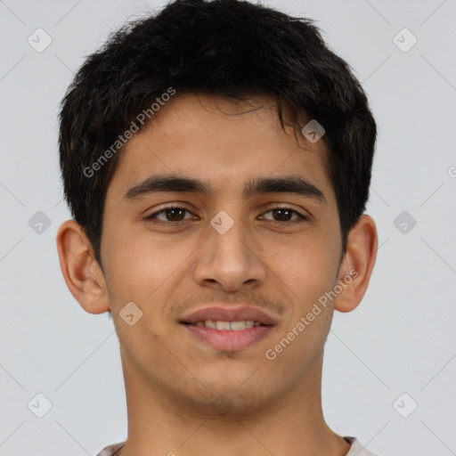 Joyful latino young-adult male with short  brown hair and brown eyes