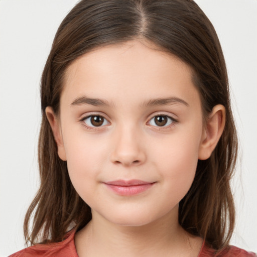 Joyful white child female with medium  brown hair and brown eyes