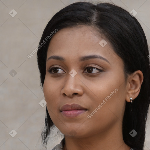 Joyful asian young-adult female with medium  black hair and brown eyes