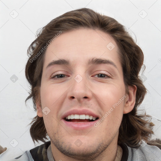 Joyful white young-adult male with medium  brown hair and brown eyes