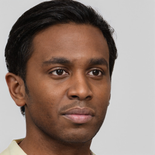 Neutral black young-adult male with short  brown hair and brown eyes