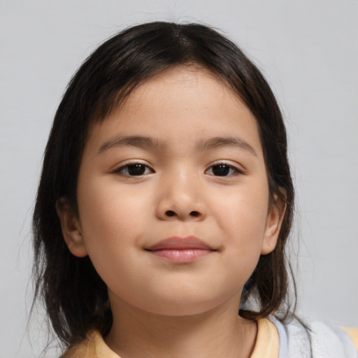 Joyful asian child female with medium  brown hair and brown eyes