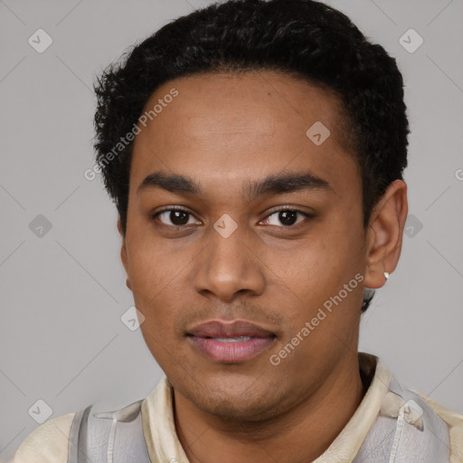 Neutral latino young-adult male with short  black hair and brown eyes