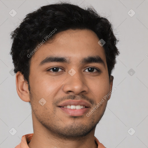 Joyful latino young-adult male with short  black hair and brown eyes