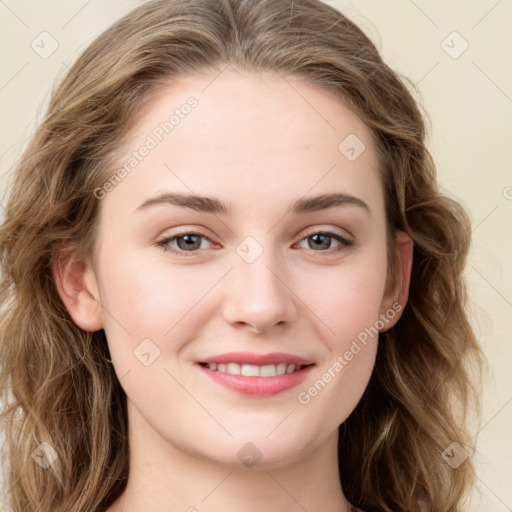 Joyful white young-adult female with long  brown hair and green eyes