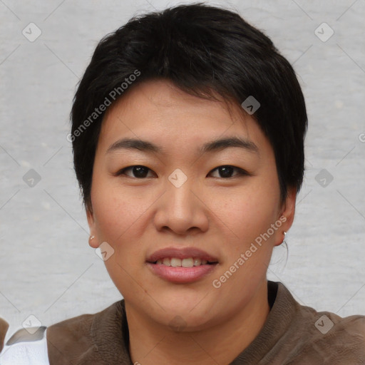 Joyful asian young-adult female with short  brown hair and brown eyes