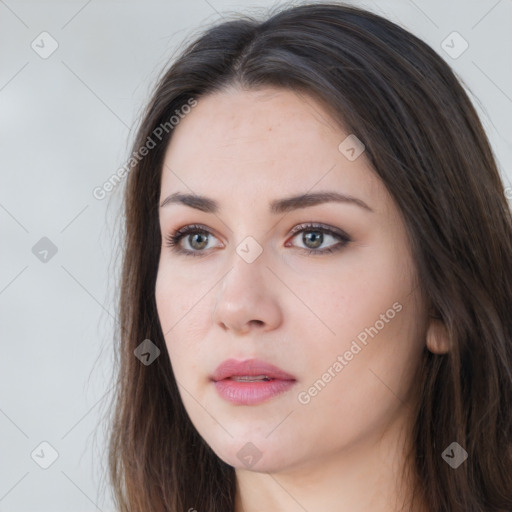 Neutral white young-adult female with long  brown hair and brown eyes