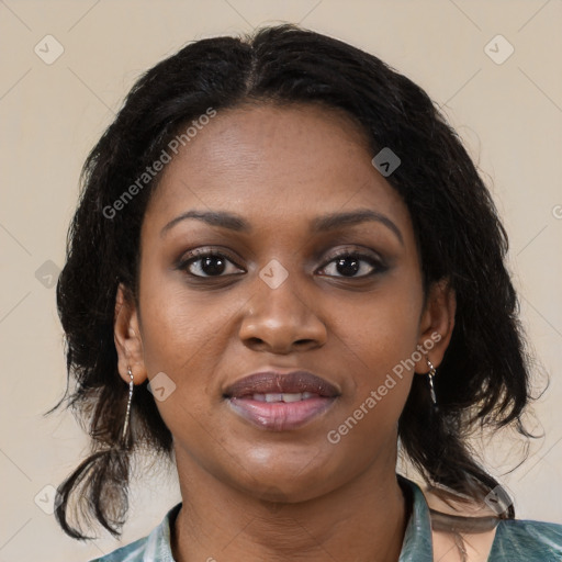 Joyful black young-adult female with medium  black hair and brown eyes