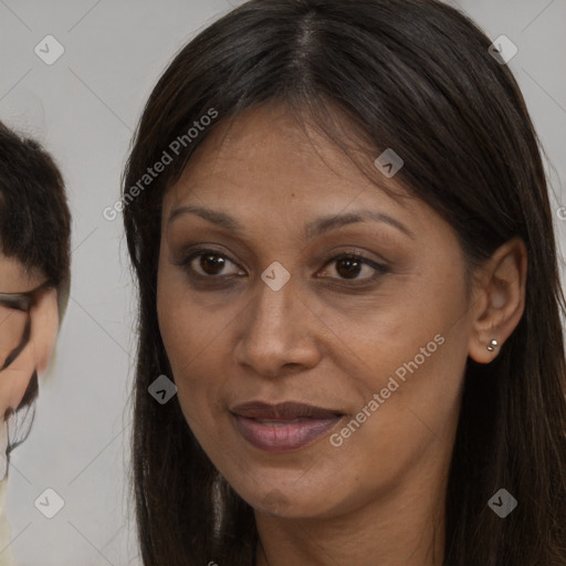 Joyful white adult female with long  brown hair and brown eyes