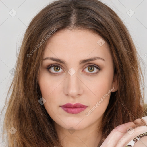 Neutral white young-adult female with long  brown hair and brown eyes