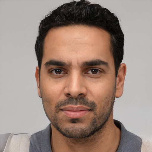 Neutral white young-adult male with short  black hair and brown eyes