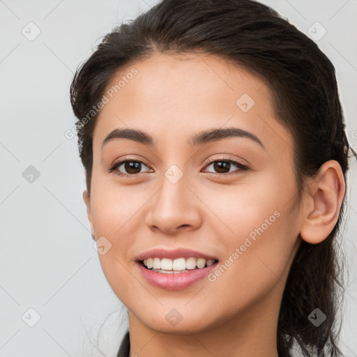 Joyful white young-adult female with long  brown hair and brown eyes