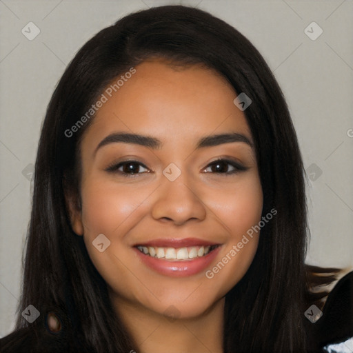 Joyful latino young-adult female with long  black hair and brown eyes