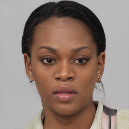 Neutral black young-adult female with short  brown hair and brown eyes