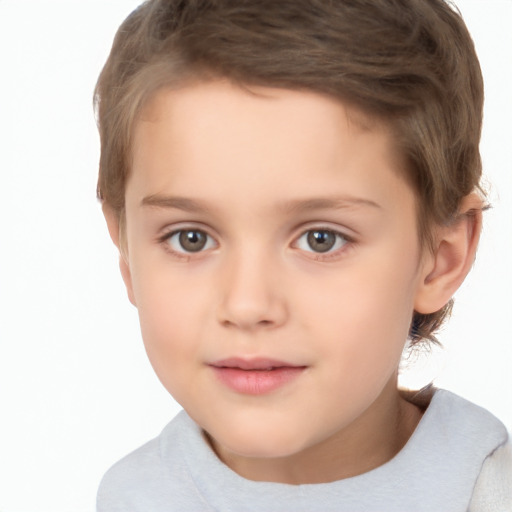 Joyful white child female with short  brown hair and brown eyes