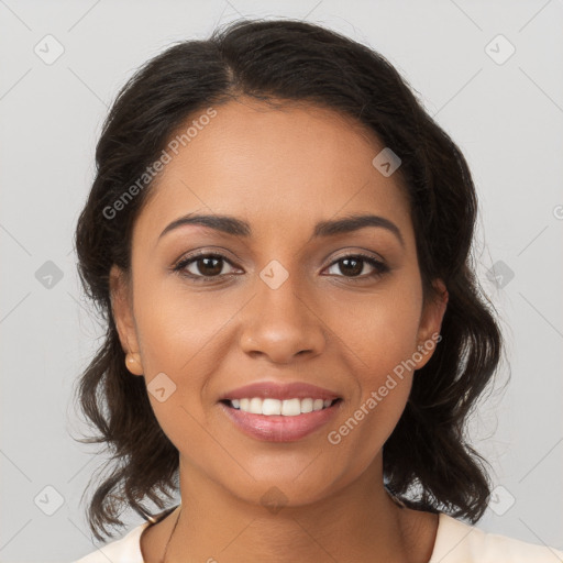 Joyful latino young-adult female with medium  brown hair and brown eyes