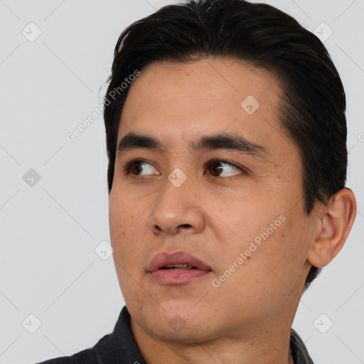 Neutral asian young-adult male with short  black hair and brown eyes