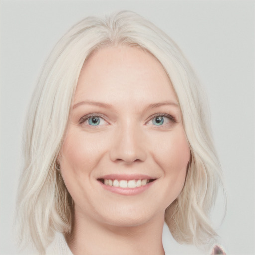 Joyful white young-adult female with medium  blond hair and blue eyes