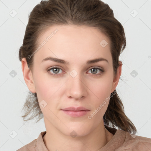 Neutral white young-adult female with medium  brown hair and grey eyes