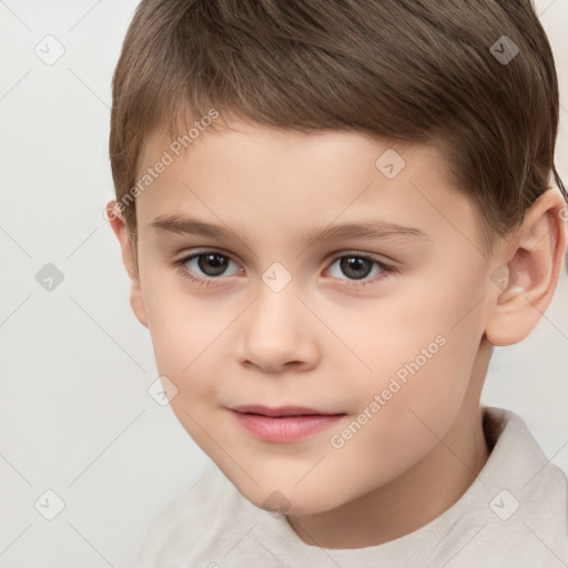 Joyful white child male with short  brown hair and brown eyes