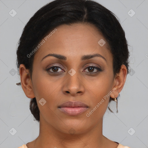 Joyful latino young-adult female with short  brown hair and brown eyes