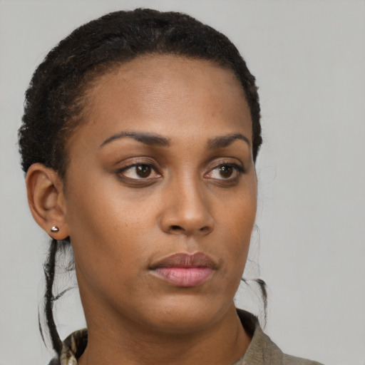 Neutral black young-adult female with short  brown hair and brown eyes