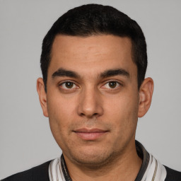 Neutral white young-adult male with short  black hair and brown eyes