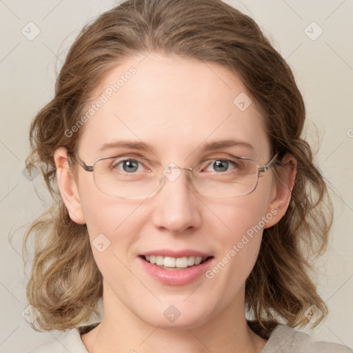 Joyful white young-adult female with medium  brown hair and green eyes