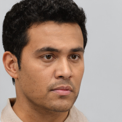 Neutral asian young-adult male with short  brown hair and brown eyes