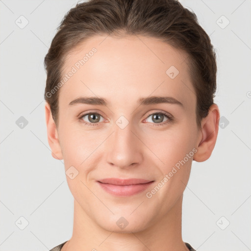 Joyful white young-adult female with short  brown hair and grey eyes