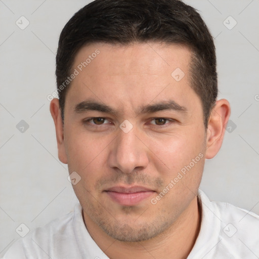 Neutral white young-adult male with short  brown hair and brown eyes