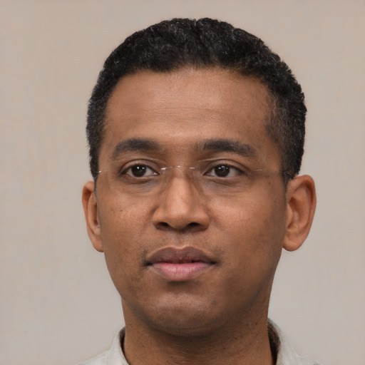 Neutral latino adult male with short  black hair and brown eyes