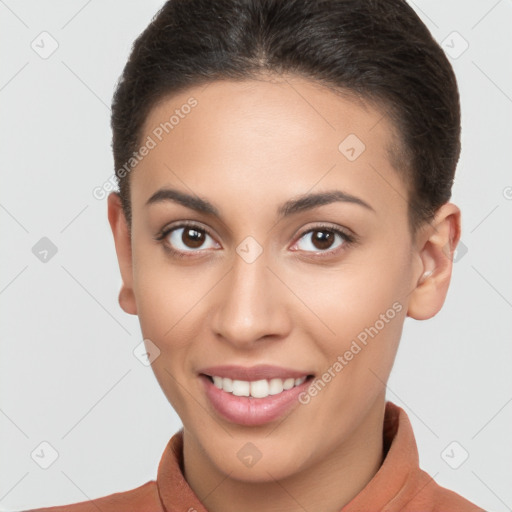 Joyful white young-adult female with short  brown hair and brown eyes