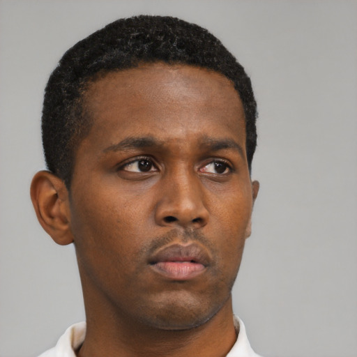 Neutral black young-adult male with short  brown hair and brown eyes