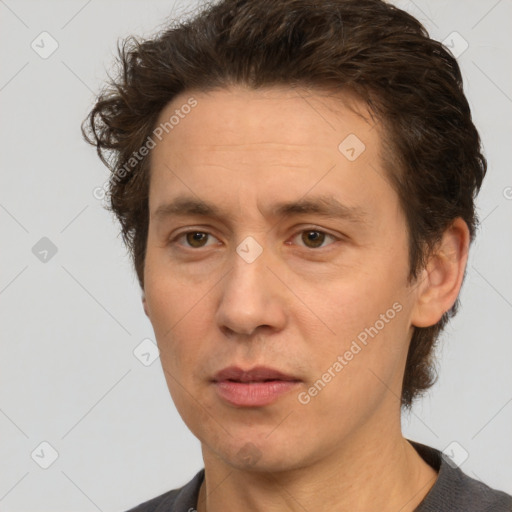 Neutral white adult male with short  brown hair and brown eyes