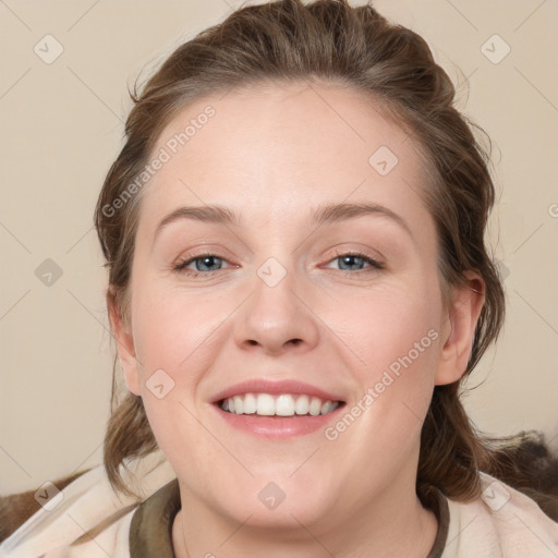 Joyful white young-adult female with medium  brown hair and blue eyes