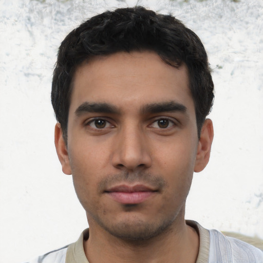 Neutral latino young-adult male with short  black hair and brown eyes