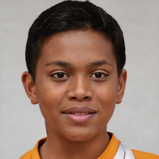 Joyful black child female with short  brown hair and brown eyes