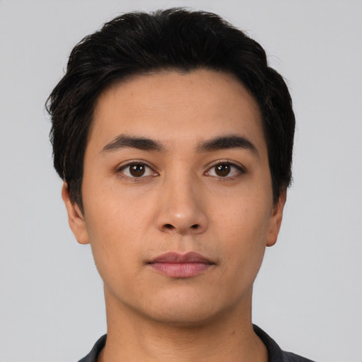 Neutral latino young-adult male with short  black hair and brown eyes