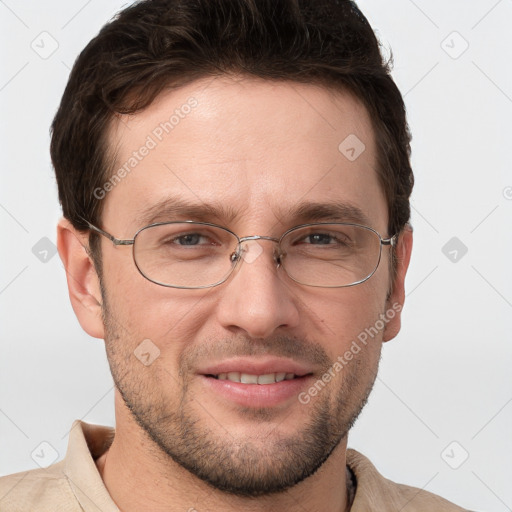 Joyful white adult male with short  brown hair and grey eyes