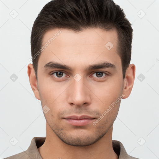 Neutral white young-adult male with short  brown hair and brown eyes