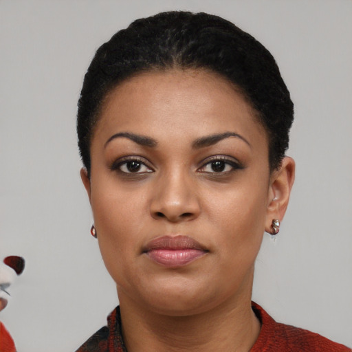 Neutral black young-adult female with short  black hair and brown eyes