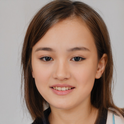 Joyful white child female with medium  brown hair and brown eyes